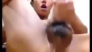 Asian guy shows hole together with jerks his flannel