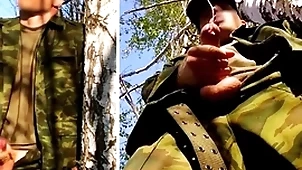 Russian gunslinger with a beamy dick on a military chore in the forest shoots sperm wean away from his penis at opponents