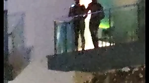 Guys caught screwing at bottom get under one's balcony